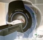 A patient goes into an fMRI Machine. (Creative Commons)